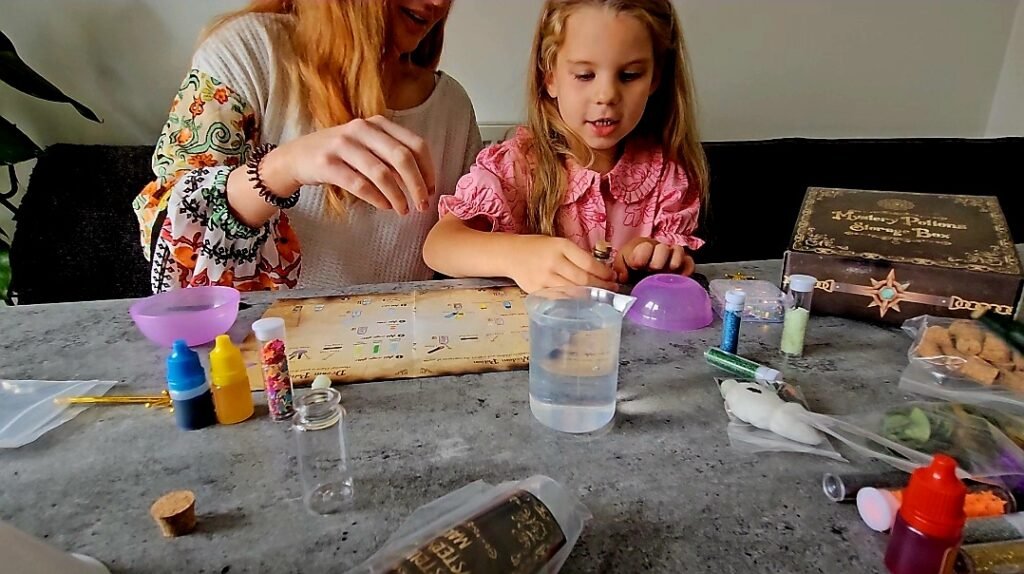 Image of mum and daughter making potions