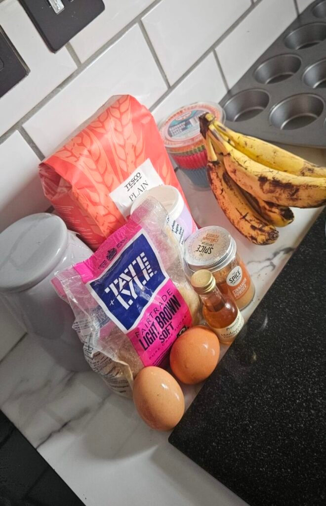 image of cake ingredients including bananas, eggs, sugar, flour