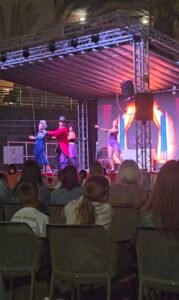 image of holiday entertainers on the stage