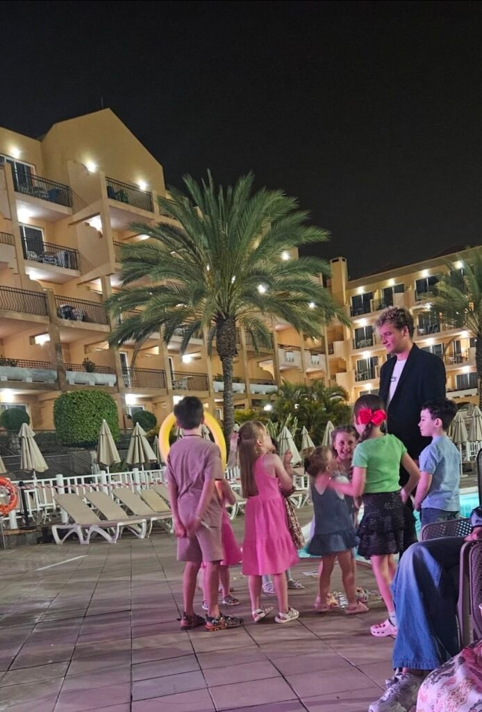 image of children at a holiday complex at night